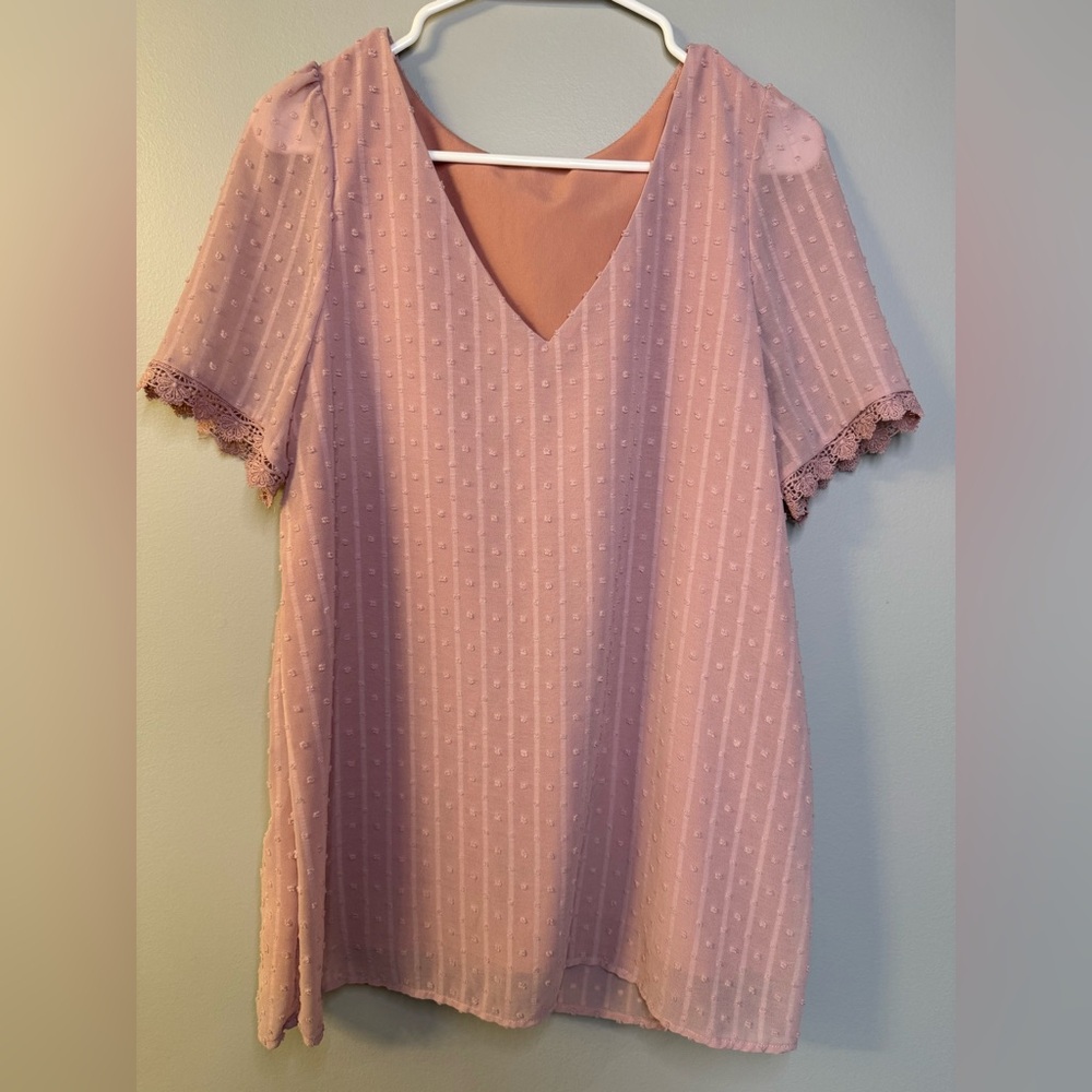Blush, double lined, textured top. Size L